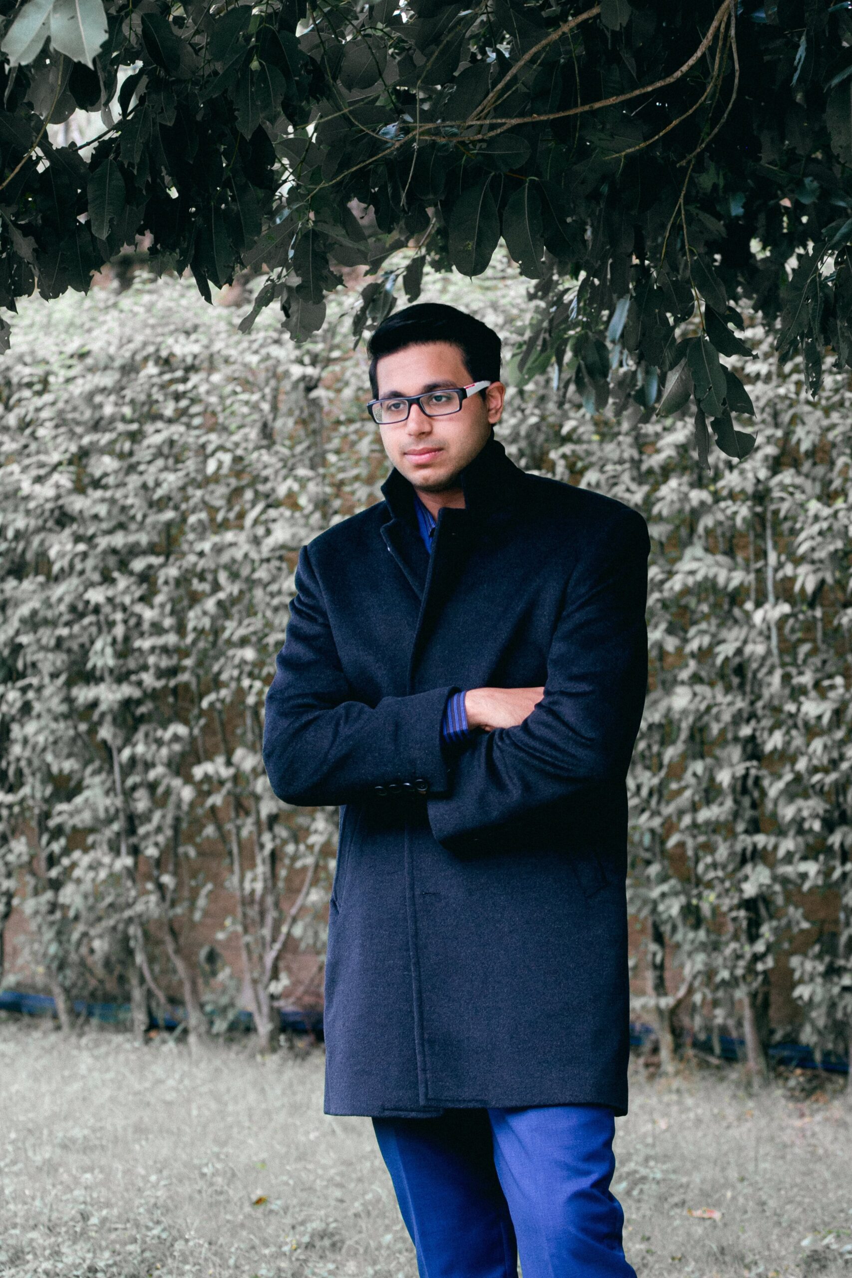 Man in a dark navy overcoat